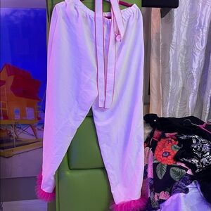 White Pants and jacket/belt with pink ruffle trim